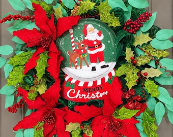 Santa Christmas Wreath with Reindeer Snow Globe and Red Poinsettias