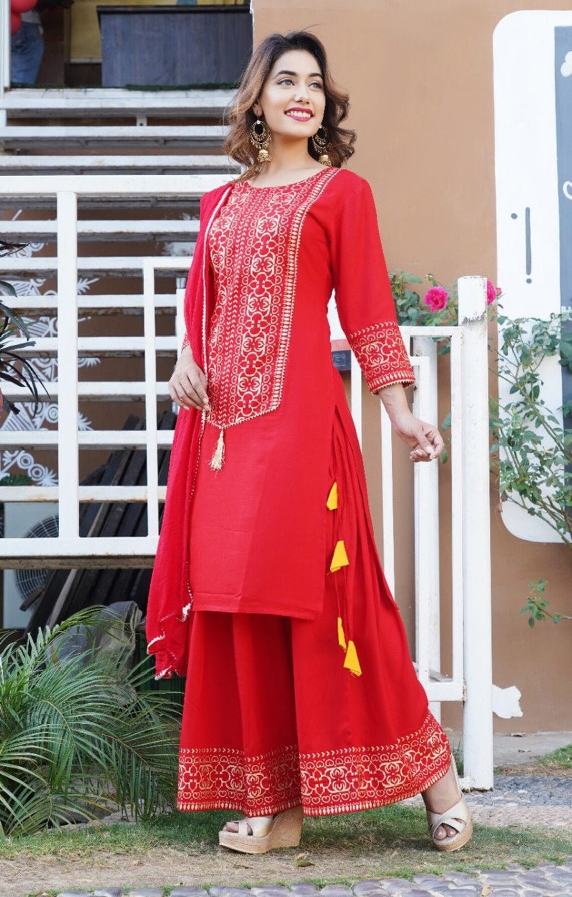 long kurti with golden skirt