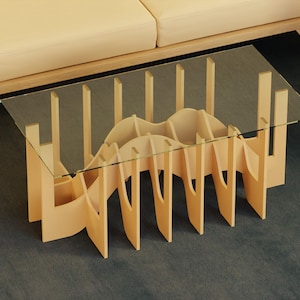 May include: A wooden coffee table with a glass top. The table has a unique, wavy design and is made of light wood.