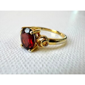 May include: A set of three ceramic mugs with a speckled, matte finish. The mugs are in shades of cream, light gray, and dark gray. Each mug has a simple, modern design and a rounded handle.