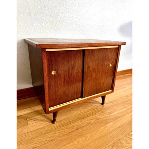 Mid-Century Wood Record Cabinet with Sliding Doors and Brass Pulls