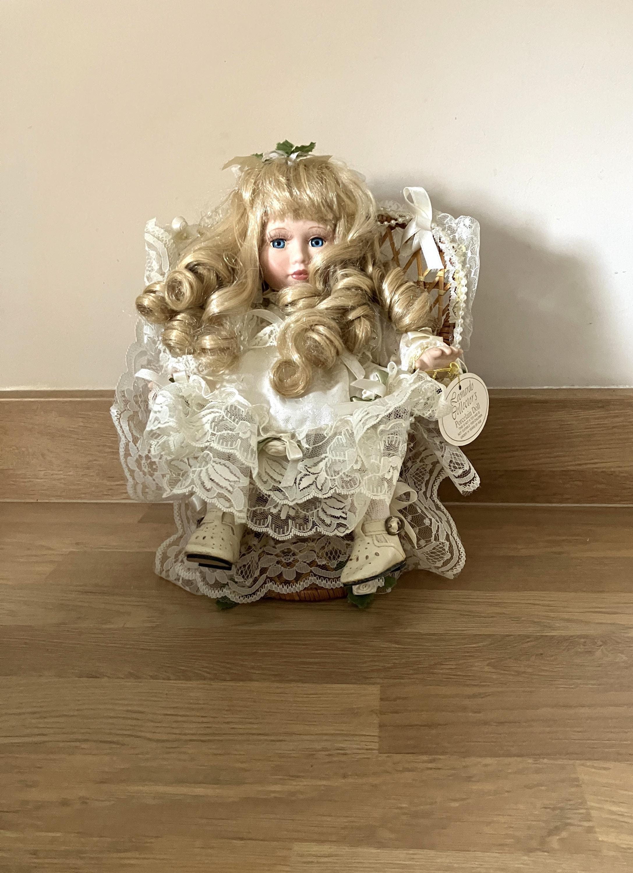 Boxed Vintage Leonardo Collectable Porcelain Doll in Display Chair