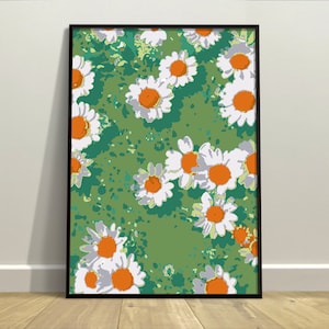 Könnte beinhalten: Ein gerahmter Druck mit grünem Hintergrund und weißen Gänseblümchen mit orangefarbenen Zentren. Die Gänseblümchen sind in einem zufälligen Muster angeordnet.