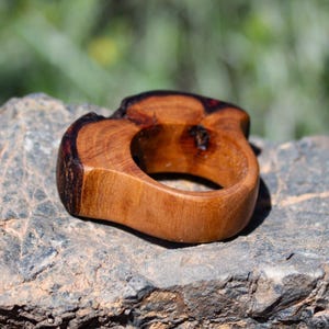 Almond wood ring head half rounded with natural bark finish