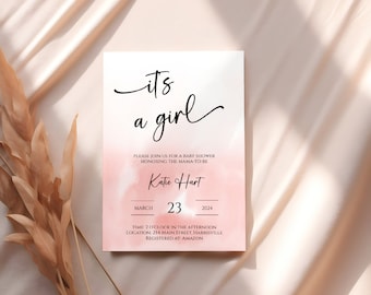 Puede incluir: Una invitación de baby shower de acuarela rosa y blanca con el texto "it's a girl" en fuente cursiva negra. La invitación incluye el nombre "Katie Hart", la fecha "March 23, 2024", la hora "2 o'clock in the afternoon", la ubicación "254 Main Street, Harrisville", y la información de registro "Registered at: Amazon".