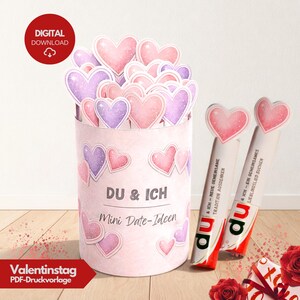 Digitale Valentinstag PDF Druckvorlage mit Herzmotiven und romantischen Mini Date Ideen. Banderolen und Karten zum Ausschneiden für Schokoriegel, ideal für Duplo-Riegel. Liebevoll gestaltetes Mitbringsel und DIY Geschenk für Paare, Partner, Freund, Freundin oder Ehepartner. Perfekt als kleine Aufmerksamkeit, Überraschung oder romantisches Mitbringsel zum Valentinstag. Geschenk passt auch zur Verlobung.