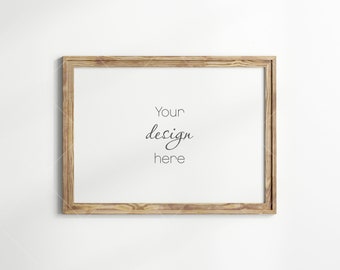 May include: A wooden frame with a white background and the text "Your design here" in black.