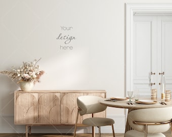 May include: A light-filled dining room scene with a wooden sideboard, round table, and chairs. A floral arrangement sits atop the sideboard. The text "Your design here" is on the wall. The room has a neutral color palette.
