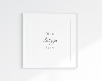 May include: A white picture frame with a white mat and the text "Your design here" inside the mat.