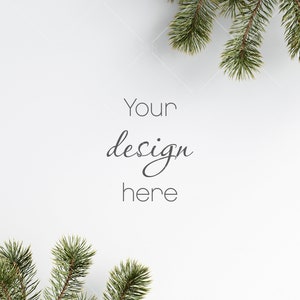 May include: White background with green pine branches in the corners. The text "Your design here" is in the center of the image.