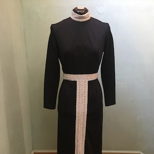 1970s black poly knit maxi dress with metallic silver belt and collar
