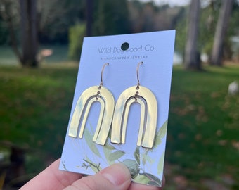 Double rainbow smooth gold plated dangle earrings. Wild Dogwood Co