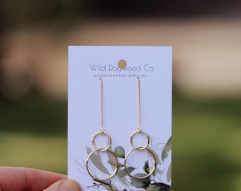 Double hoop dangling brass earrings. Wild Dogwood Co.