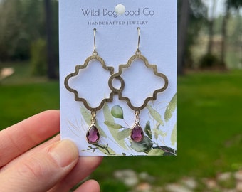 Moroccan hammered brass dangle earrings with purple accent bead. Wild Dogwood Co
