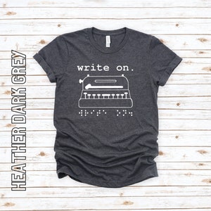 write on. Soft-style T-shirt with Braille