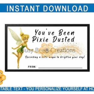May include: A rectangular card featuring a fairy with blonde hair and green clothing, gold glitter dust, and the text: You've Been Pixie Dusted, Spreading a little magic to brighten your day!, and FROM:. The design includes a honeycomb logo with a bee.