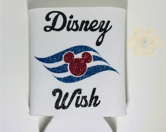 May include: White can cooler with the words "Disney Wish" in black script. The design includes a red glitter Mickey Mouse head and blue glitter waves. A small logo is visible in the upper right corner.