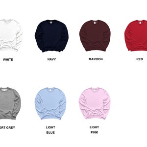 May include: A set of ten crew neck sweatshirts in various colours, including black, white, navy, maroon, red, dark heather, indigo blue, sport grey, light blue, and light pink.