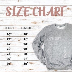 May include: Size chart for a sweatshirt with measurements in inches for chest and length. Sizes range from S to 4XL.