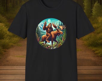 Bigfoot Riding a Moose T-shirt: Cryptid Humor Outdoor Adventure Shirt, PNW Sasquatch Moose Ride Tee