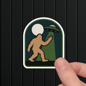 Bigfoot UFO Encounter Sticker: Retro Sasquatch Alien Decal