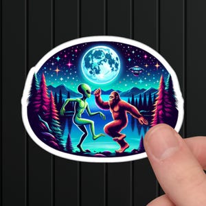 Bigfoot & Alien Dance Party Sticker: Funny Cryptid UFO Art