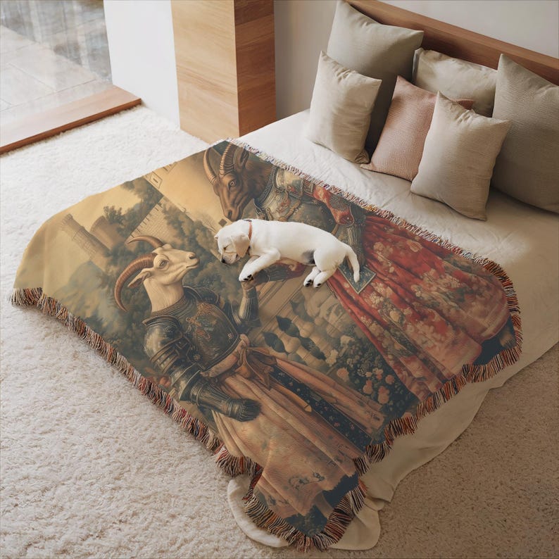 Woven blanket showing two goats in medieval armor and gowns on a castle terrace, surrounded by flowers and historical fantasy scenery