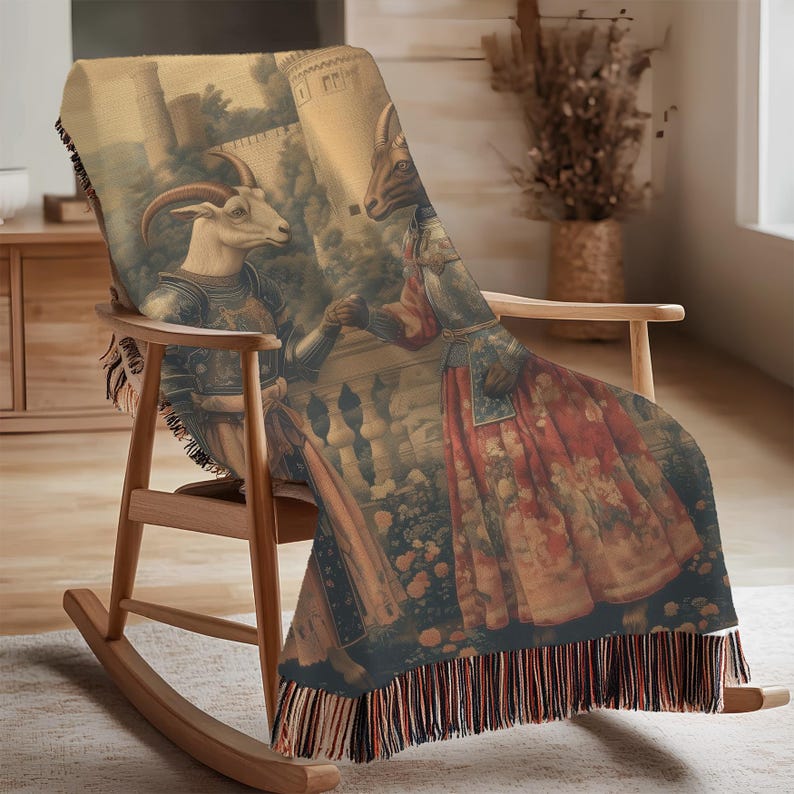 Woven blanket showing two goats in medieval armor and gowns on a castle terrace, surrounded by flowers and historical fantasy scenery