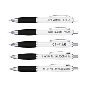 May include: Five white pens with black grips and silver accents. Each pen features a different humorous phrase: "Later is my favourite time of day," "Thriving on avoidable pressure," "Do it now?... Hard pass," "In my 'leave that until tomorrow' era," and "Not lazy just strategically delaying."
