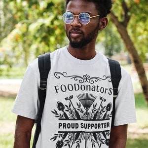White and black plant lover shirt saying FOODonator$ proud supporter.