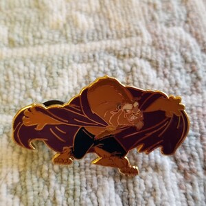 Disney Beauty and the Beast pin of Beast with arms out and purple cape