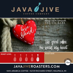 May include: Coffee bag with a red heart-shaped label that says "love blend" on a wooden background. The bag is labeled "Java Jive Coffee Company" and includes the text "Like great coffee. You warm my heart."
