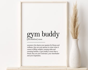 May include: A black and white printable wall art print with the definition of the word "gym buddy". The definition reads: "someone who shares your passion for fitness and wellness, they are your partner in crime when it comes to lifting weights, running miles and sweating buckets, a gym buddy is more than a friend, they are your motivator, your cheerleader and your inspiration."