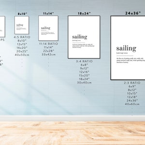May include: A white wall with six black frames displaying different sizes of a printable poster with the word "sailing" and its definition. The poster is available in various sizes, including 8x10 inches, 11x14 inches, 18x24 inches, and 24x36 inches. The poster is a great way to add a nautical touch to any room.