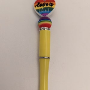 Rainbow beaded pen.