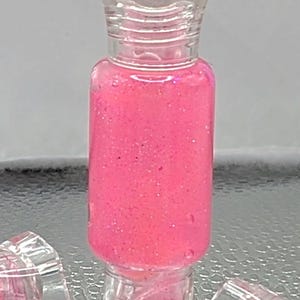 bubble gum  flavored lip gloss goes on smooth and clear non-sticky