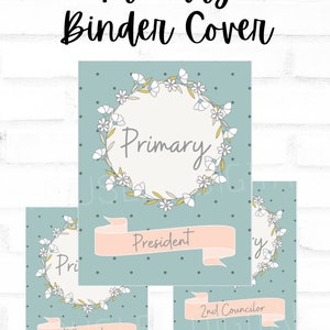 May include: Four printable binder covers with a floral wreath design. The covers are in shades of blue, white, and yellow. The text on the covers reads "Primary", "President", "1st Councilor", and "2nd Councilor".