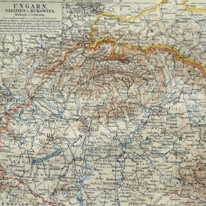 May include: An antique map of Hungary, Galicia, and Bukovina, with detailed geographical features. The map is in shades of brown, beige, and blue, with text in German. The scale is 1:3,000,000.
