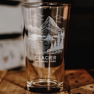 Glacier National Park Pint Glass – Scenic Mountain Landscape, Forest, and Wildlife Souvenir Drinkware