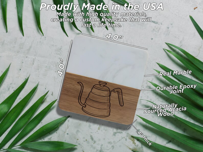 a wooden coaster with a marble top, placed on a white background with green leaves.