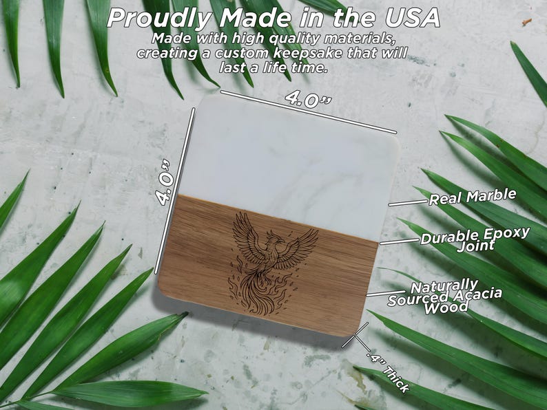 a marble coaster with a wooden design, surrounded by green leaves.