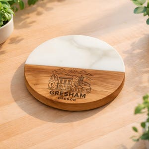 May include: A rustic wooden sign with the text "Welcome to our home" in white lettering. The sign features a distressed finish and a simple, inviting design, perfect for entryway decor.