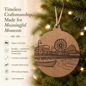 a wooden ornament hanging on a Christmas tree, depicting a ferris wheel and a boat. The ornament is described as a "Timeless Craftsmanship" made for "Meaningful Moments" and includes a three-inch diameter. It is also noted that the ornament is made in the USA and includes twine string, gift-ready packaging, and is laser engraved.