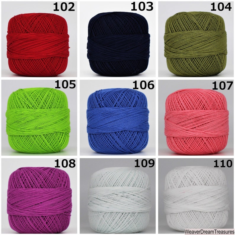 May include: Nine balls of yarn in different colors, including red, blue, green, pink, purple, and white. The yarn is arranged in three rows of three balls each. The numbers 102, 103, 104, 105, 106, 107, 108, 109, and 110 are printed above each ball of yarn.