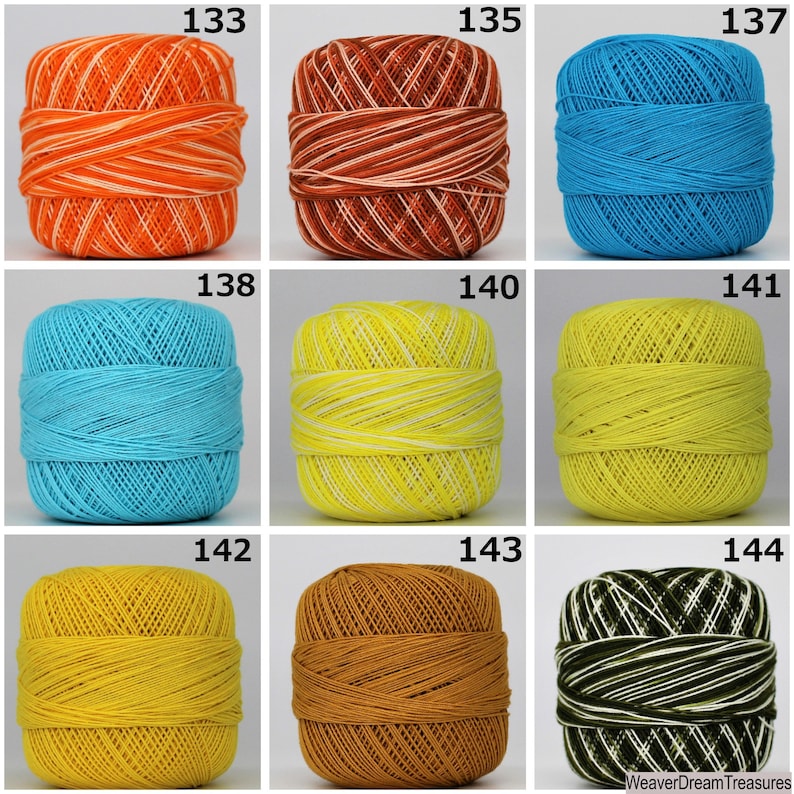 May include: Assortment of 10 balls of yarn in various colors, including orange, brown, blue, yellow, and green. Each ball has a white stripe pattern.