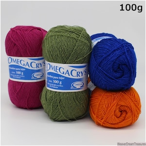 May include: Four balls of yarn in different colors: fuchsia, olive green, royal blue, and orange. Each ball is labeled "OMEGA CRYS" and "CONT. 100 g".