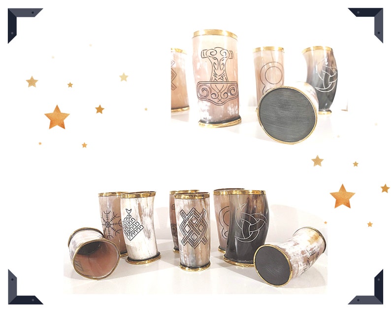 May include: Set of six drinking horns with various Norse-inspired designs, including a hammer, a knot, and a circle. The horns are made of natural materials and have a polished finish. The horns are displayed on a white surface with a gold rim.
