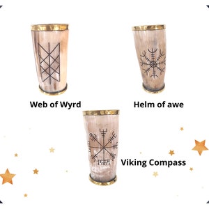 May include: Three drinking horns with different Viking symbols carved into them. The horns are made of wood and have a brass rim. The symbols are "Web of Wyrd", "Helm of awe", and "Viking Compass".