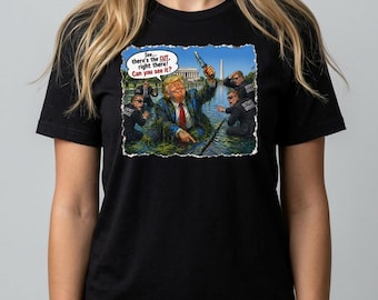 Camiseta de sátira política: Camiseta com humor em desenho animado de Trump, vestuário para protesto e ativismo.