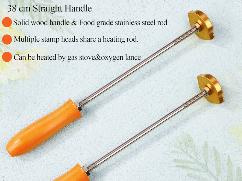 May include: Two 38 cm long straight handles with orange wooden handles and gold metal stamp heads. The handles are made of food grade stainless steel and can be heated by a gas stove or oxygen lance.